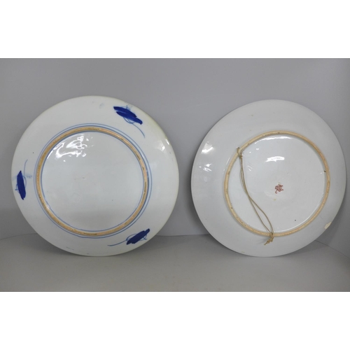 827 - Two Chinese chargers, an Imari plate, ginger jar and two large oriental figures, one a/f