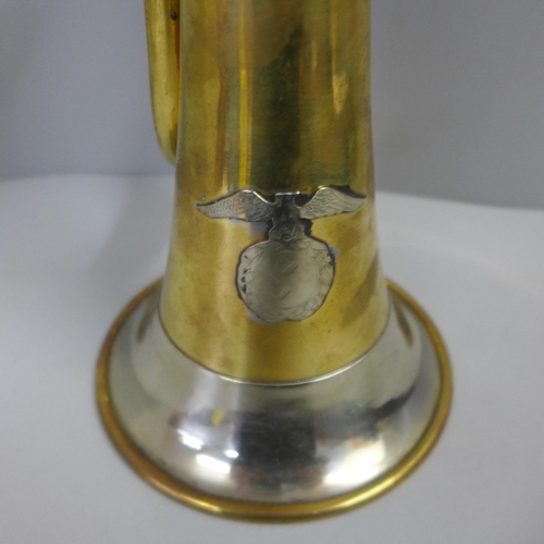 834 - A bugle with later applied German badge