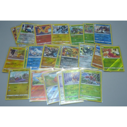 857 - Fifty-three holographic Pokemon cards