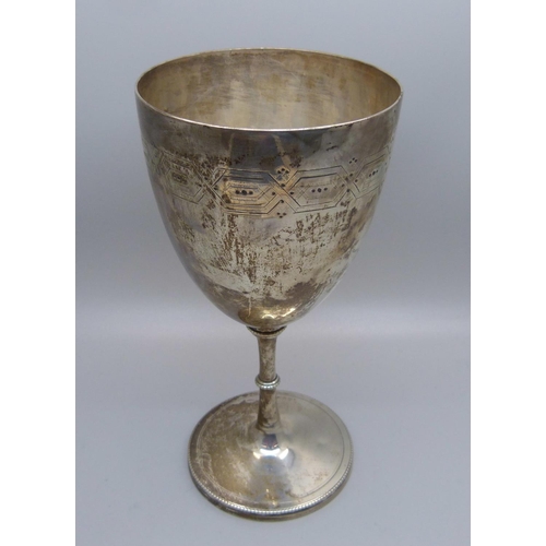 864A - A Victorian silver goblet, 204g, hallmarks worn, with inscription