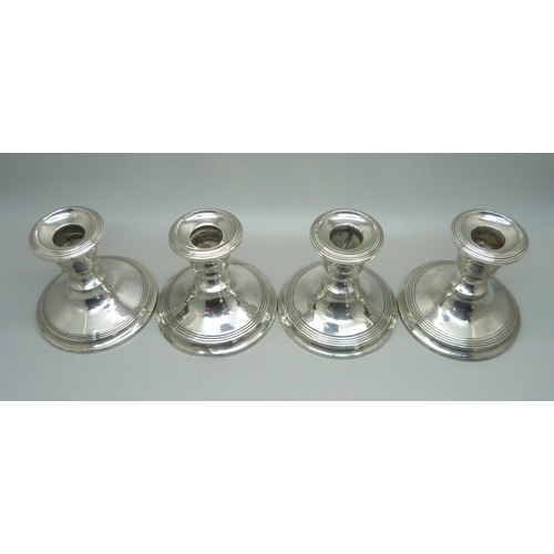 865 - A set of four silver candlesticks, Birmingham 1908/1909, 7.5cm