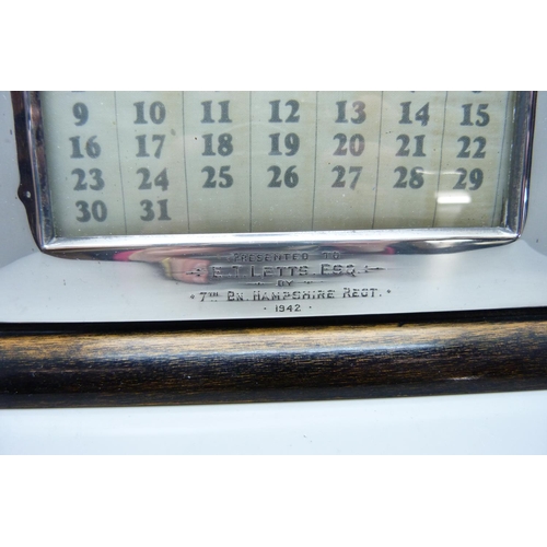 869 - A silver desk calendar with 7th Battalion Hampshire Regiment related inscription dated 1942, base 21... 