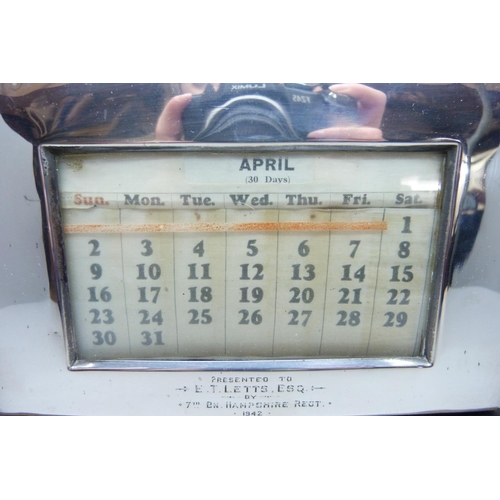 869 - A silver desk calendar with 7th Battalion Hampshire Regiment related inscription dated 1942, base 21... 