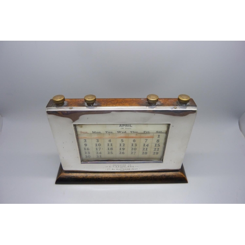 869 - A silver desk calendar with 7th Battalion Hampshire Regiment related inscription dated 1942, base 21... 