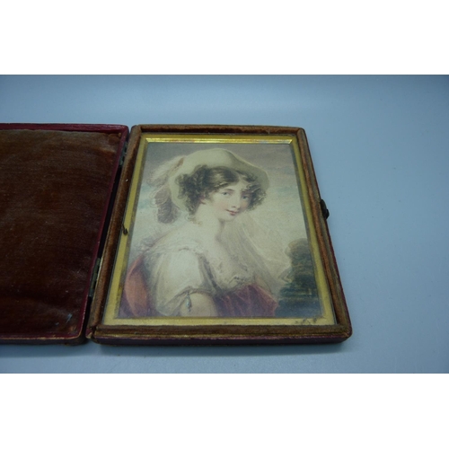 883 - An early Victorian watercolour of a young lady, in a folding frame