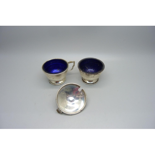 888 - Two silver mustards with glass liners, one hinge a/f