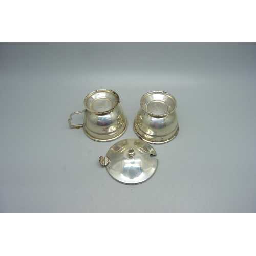 888 - Two silver mustards with glass liners, one hinge a/f