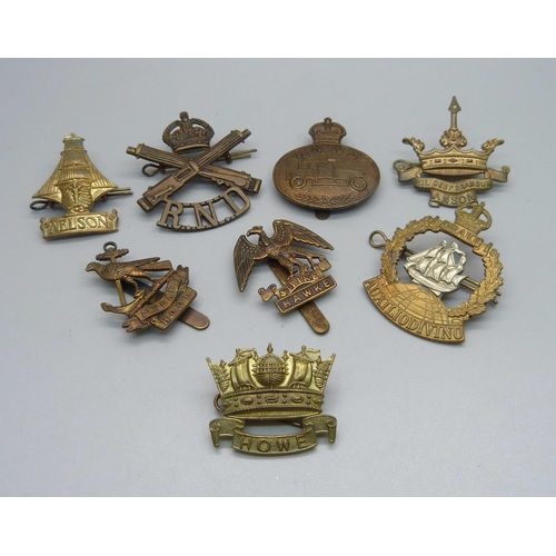 926 - A collection of Royal Navy badges