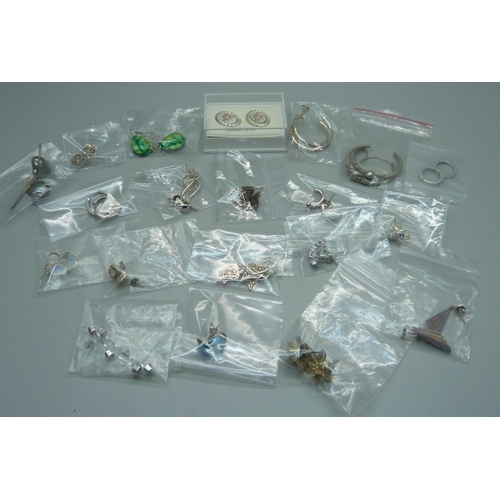 956 - Twenty pairs of silver and white metal mounted earrings