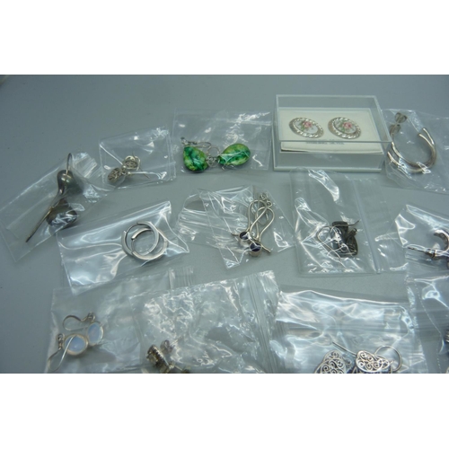 956 - Twenty pairs of silver and white metal mounted earrings