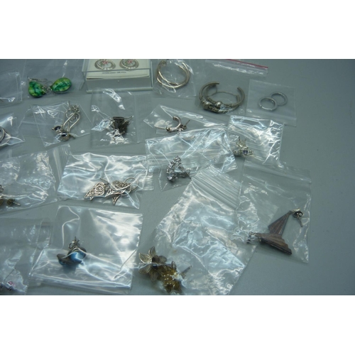 956 - Twenty pairs of silver and white metal mounted earrings