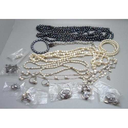 963 - A collection of pearls including some silver mounted