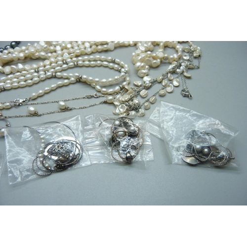 963 - A collection of pearls including some silver mounted