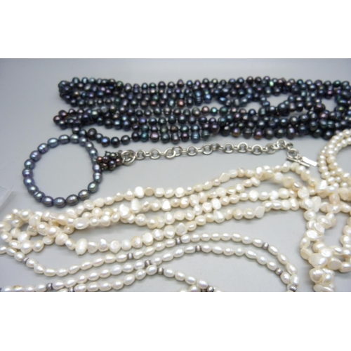 963 - A collection of pearls including some silver mounted