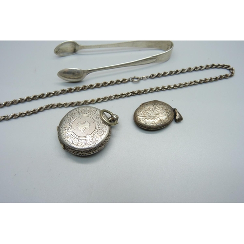 985 - A silver rope chain, silver sugar bows, a locket  and a silver watch case, 68g