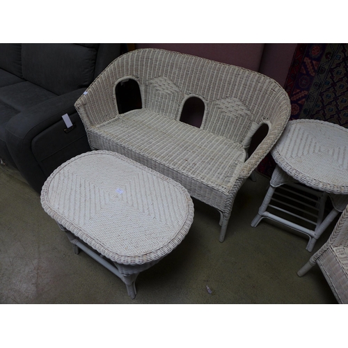 1524 - A white painted wicker conservatory set including two seater sofa, armchair, coffee table and side t... 