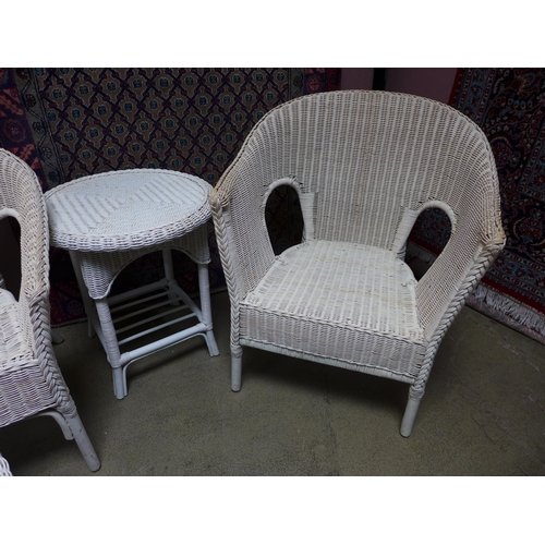 1524 - A white painted wicker conservatory set including two seater sofa, armchair, coffee table and side t... 