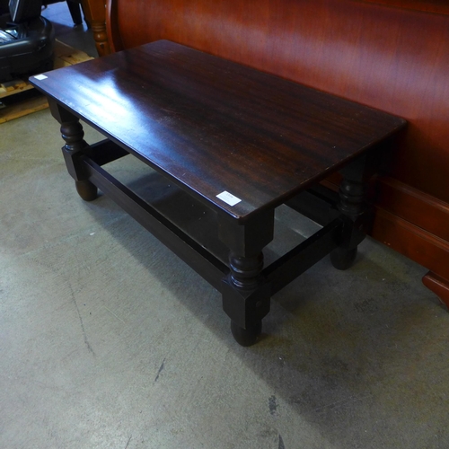 1534 - A dark stained oak coffee table