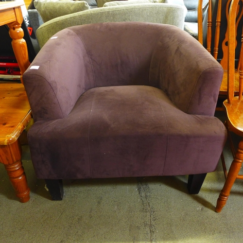 1537 - A plum upholstered armchair