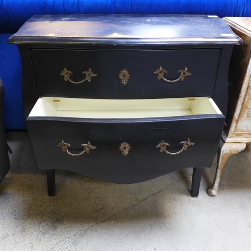 1540 - A black painted two drawer bombe chest and single drawer, single door chest