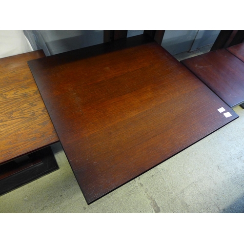 1635 - A stained timber dining table