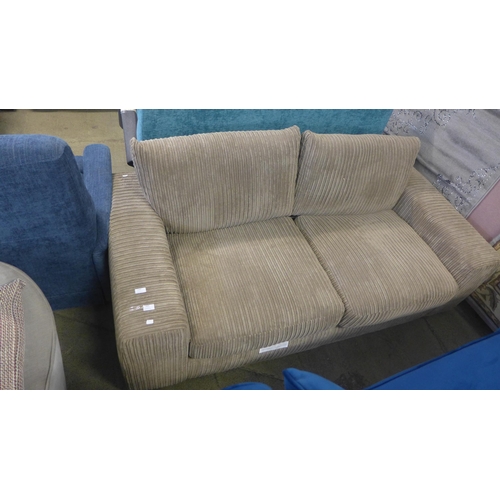 1584 - A mink jumbo corduroy 2.5 seater sofa