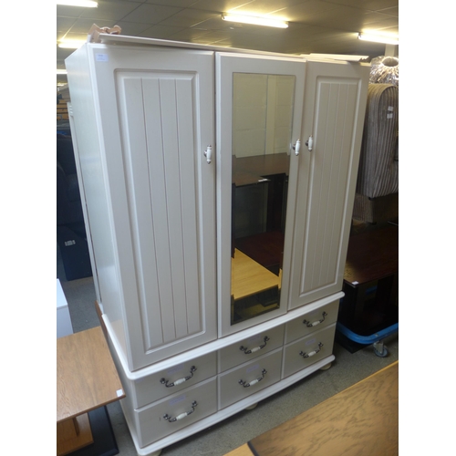 1610 - A white painted three door, six drawer wardrobe