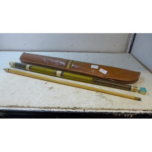 2269 - Two piece snooker cue and Antler suitcase bag