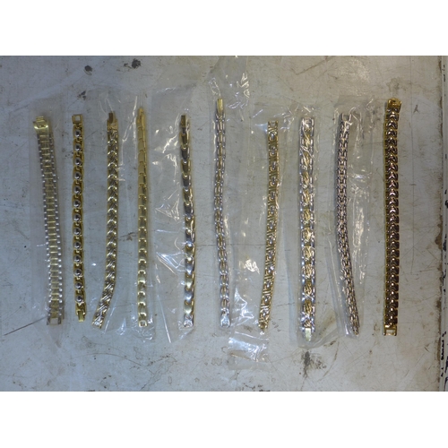 2295 - 10 new and unused gold plated bracelets