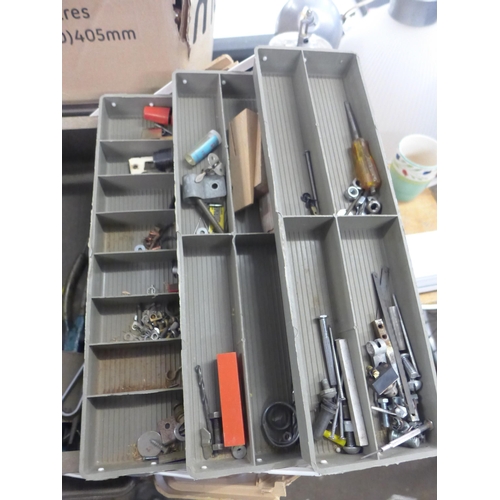 2421 - A box of woodworking tools including a drill stand, files and chisels, a plastic tub containing nail... 