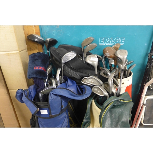 2454 - 5 bags of golf clubs (Donnay, Enforcer, Bullet, Kings)