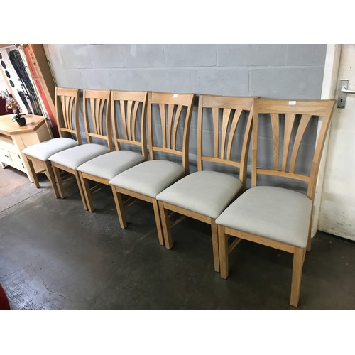 1427 - A set of six oak and dark grey upholstered dining chairs