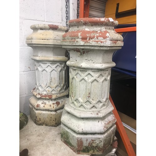 2488 - A pair of faux terracotta chimney pots