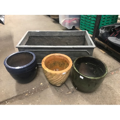 2489 - Two glazed terracotta planters and two others