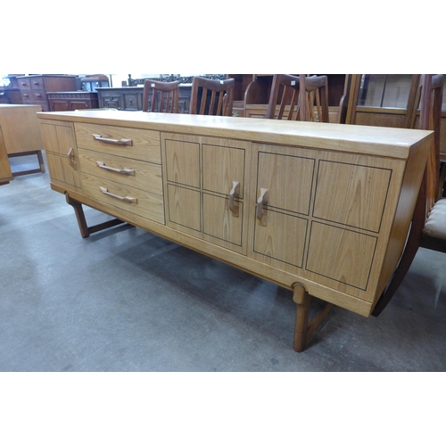 55 - A teak sideboard