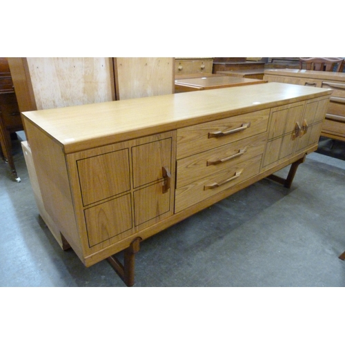 55 - A teak sideboard