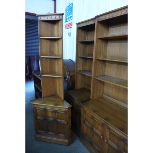 104 - A large Ercol Golden Dawn elm sectional wall unit