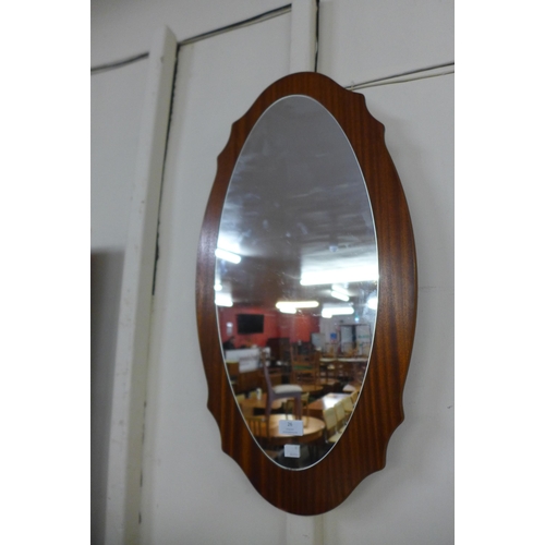 26 - A teak framed mirror