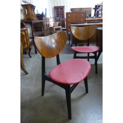 27 - A G-Plan Librenza tola wood drop-leaf table and two pairs of chairs