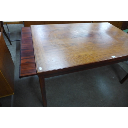 30 - A Danish rosewood extending dining table, CITES A10 no. 630306/05