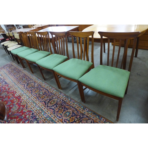 33 - A set of six McIntosh teak dining chairs