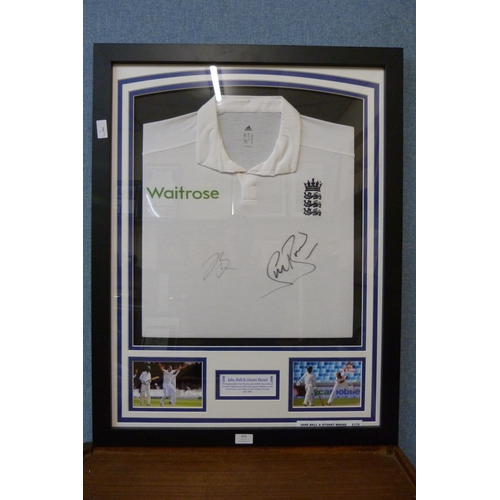 356 - A framed autograph display, England Waitrose Sponsored cricket shirt, Stuart Broad and Jake Bell