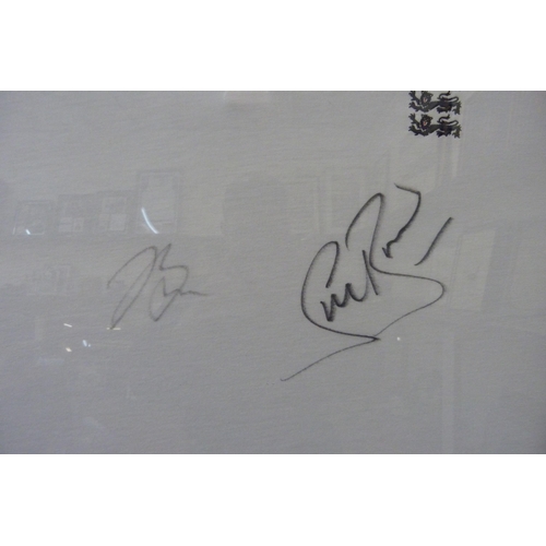 356 - A framed autograph display, England Waitrose Sponsored cricket shirt, Stuart Broad and Jake Bell