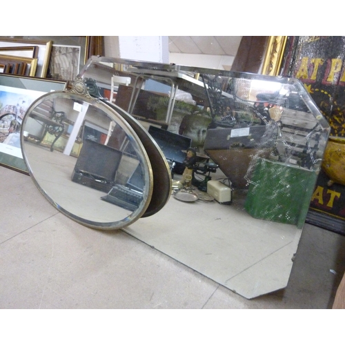 364 - An Art Deco oval brass framed mirror and one other