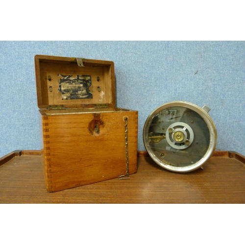 374 - A vintage cased pigeon racing clock