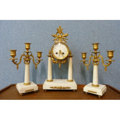 375 - A 19th Century French gilt metal and white marble clock garniture