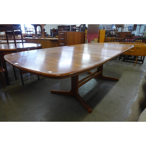 38 - A Danish teak extending dining table