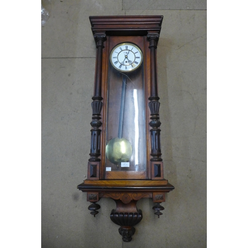 381A - A 19th Century walnut Vienna wall clock