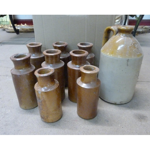 382 - Assorted stoneware jars and a flagon