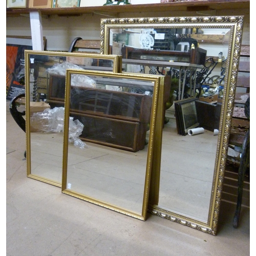 384 - Three gilt framed mirrors